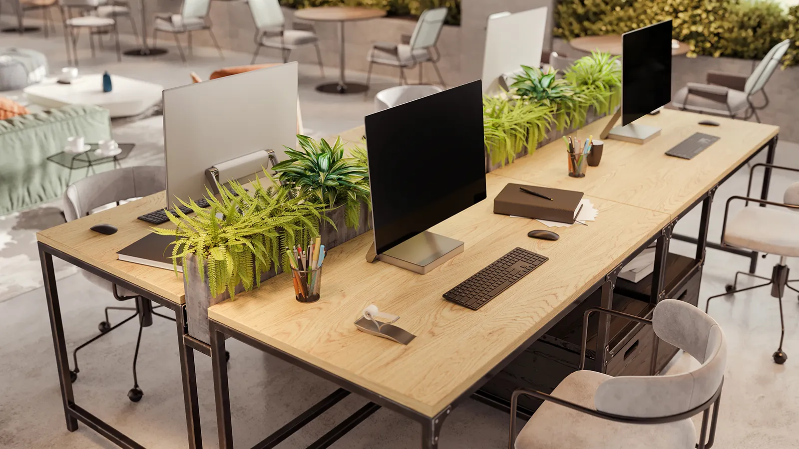A modern workspace utilizing interior landscape design with large custom planter boxes to create natural zones between desks.