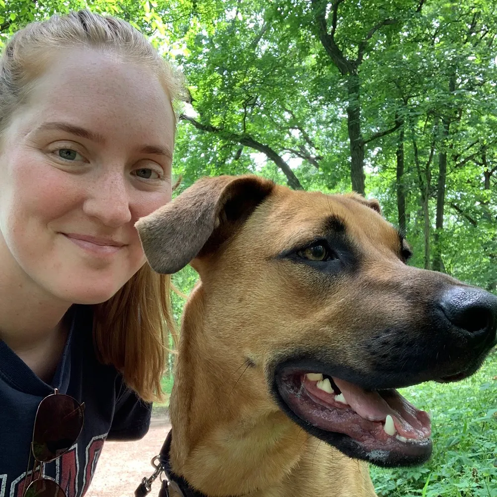 Selfie of Tori and her dog.