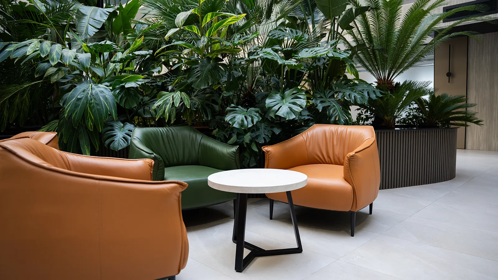 Biophilic Design Firm Commercial Installation Biophilic design firm installed large plants and planters in a commercial interior
