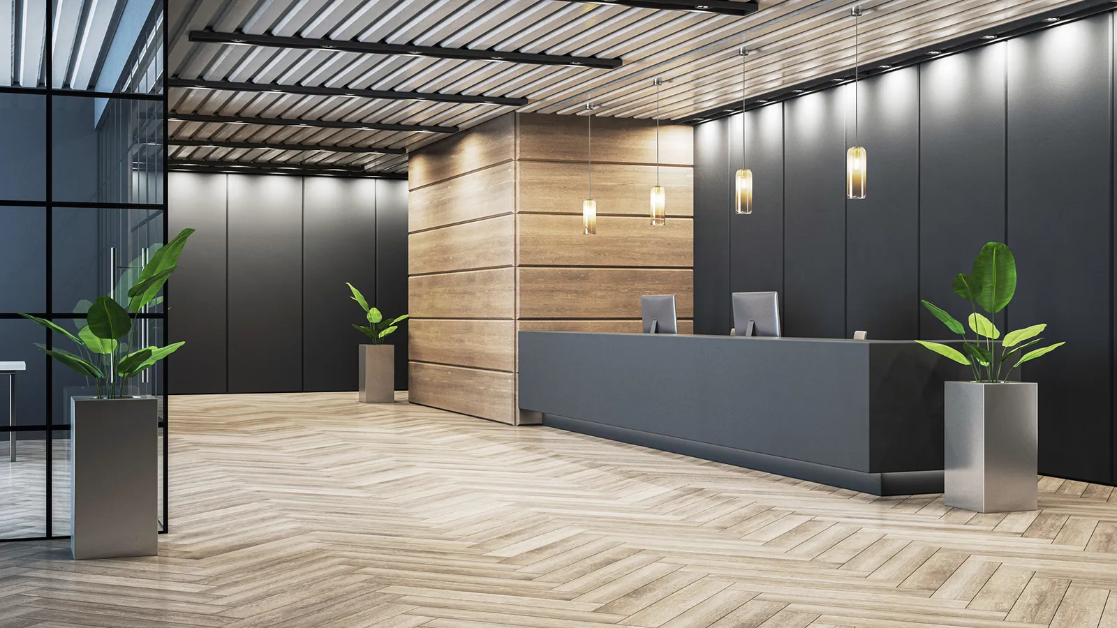 Modern commercial office reception area with decorative indoor plants and contemporary furnishings.
